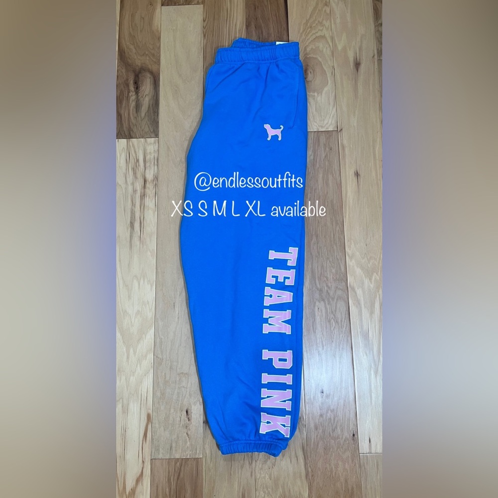 VS PINK BLUE CHARGE LIMITED EDITION SWEATPANTS WITH PINK LOGOS